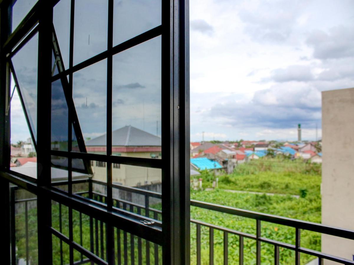 Oyo 90162 Remboelan Guest House Sungai Lutus Exterior foto